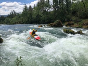 white water camp kids paddling on the Santiam River