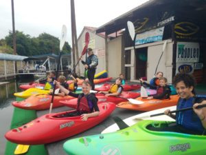 white water camp kids excited to learn how to kayak