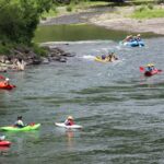 Summer camp kids rafting and kayaking on the Clackamas river