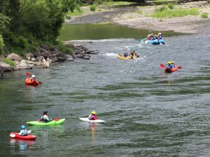 Summer camp kids rafting and kayaking on the Clackamas river